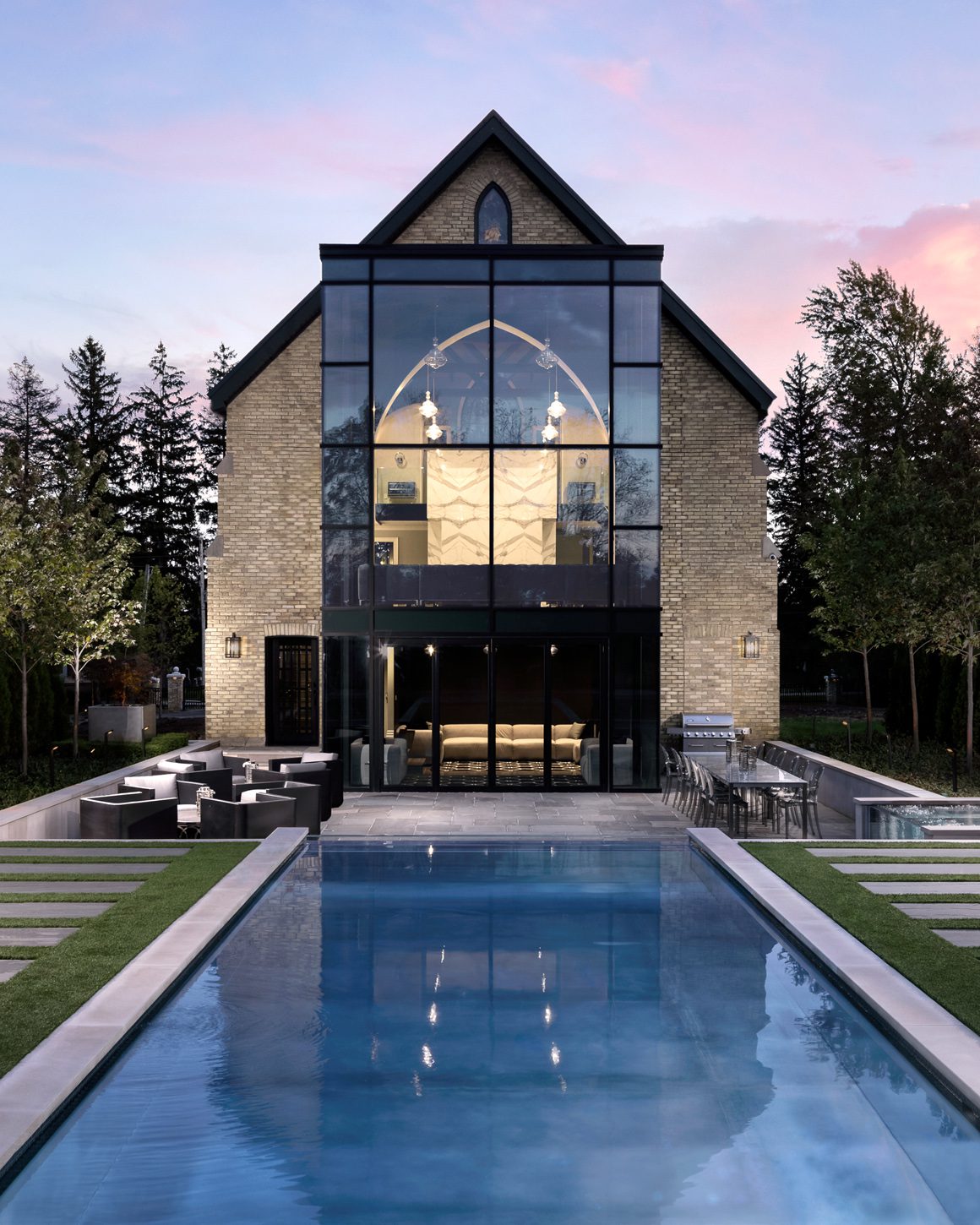 Backyard of church renovation with glass cube addition